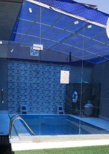 Al Aqiq Villa | فلل ومسابح بلوسكاي الباحه-العقيق فله من ثلاث غرف نوم