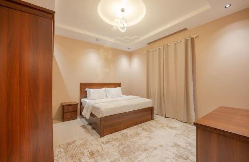 Hera Street Apartment | 1BR with 1LR with Free Airport Pickup