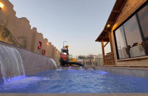 Dhahban Ski Chalet | أكواخ سدره
