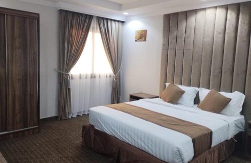 Mecca Apartment | شقق كوثر النزهة الفندقية