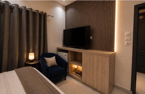 Al Bawadi Apartment | غرفة وحمام