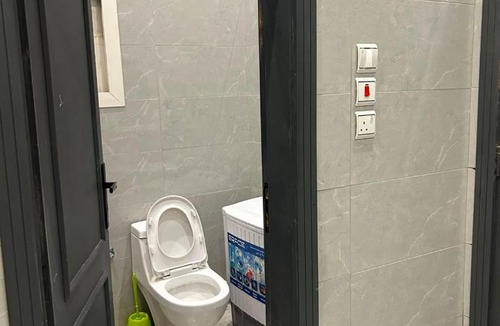Al Bawadi Apartment | غرفة وحمام