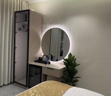 Al Izdihar Apartment | Cozy 1BR 65 inch TV Bathtub and Outdoor Seating