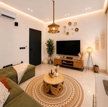 One bedroom and a living room with a bohemian style in Riyadh