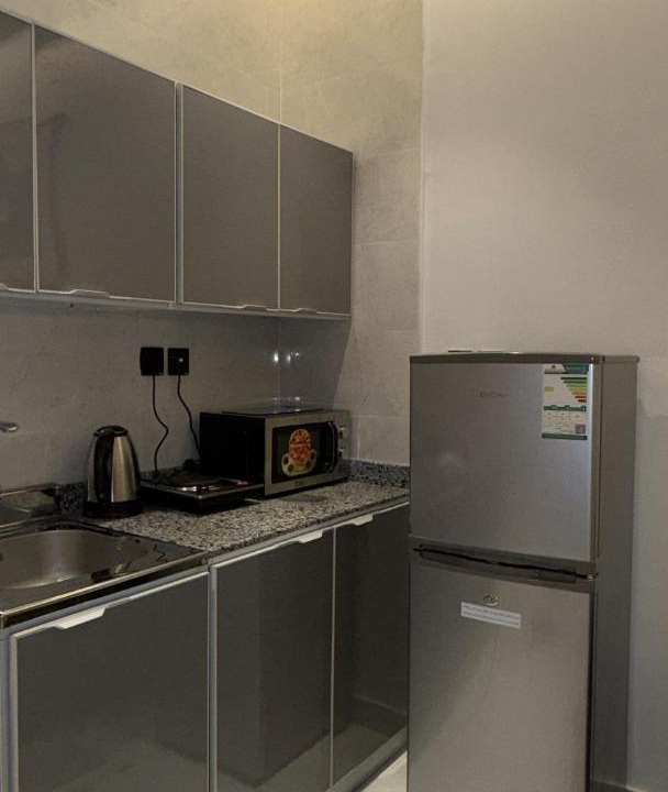 Al Bawadi Apartment | Luxury apartment with two rooms and a lounge