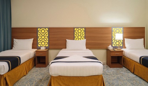 Deluxe Triple Room