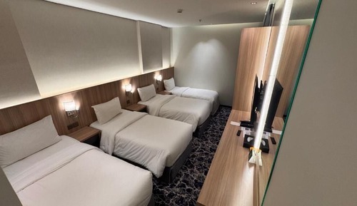 Deluxe Quadruple Room, City View