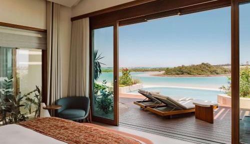 Connecting Villa Including 700 Resort Credit Per Person Per Night and Shared Airport Bus Transfers 