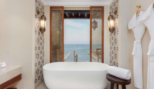 Family water villa with exclusive infinity swimming pool