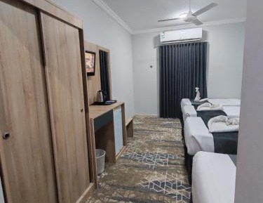 Quadruple Room with Private Bathroom