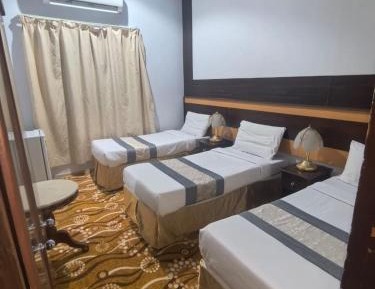 Quadruple Room with Private Bathroom