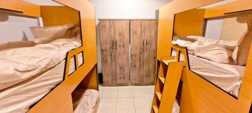 Single Bed in Male Dormitory Room