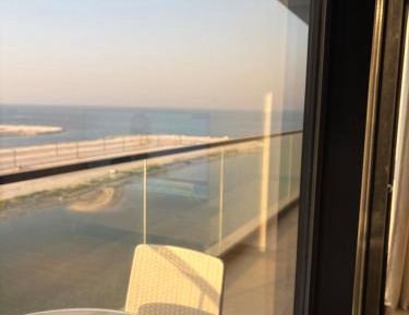 Three-Bedroom Apartment with Sea View
