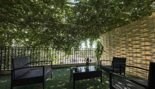 Four-Bedroom Apartment with Balcony 