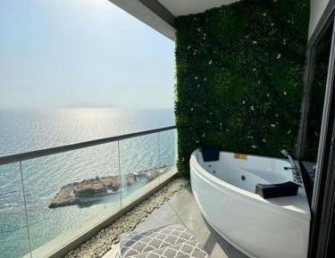 One-Bedroom Apartment with Balcony and Sea View