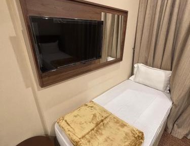 Quadruple Room with Private Bathroom