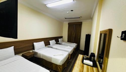 Quadruple Room with Private Bathroom