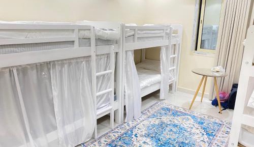 Single Bed in Dormitory Room
