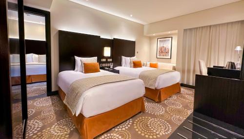 Standard Room with One King Bed and Two Single Beds