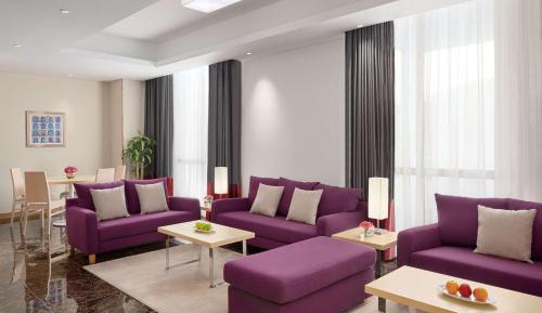 Three-Bedroom Apartment with Maid Room