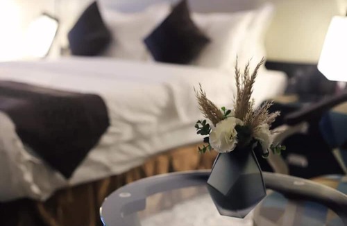 Unaizah Hotel | Artama Hotel