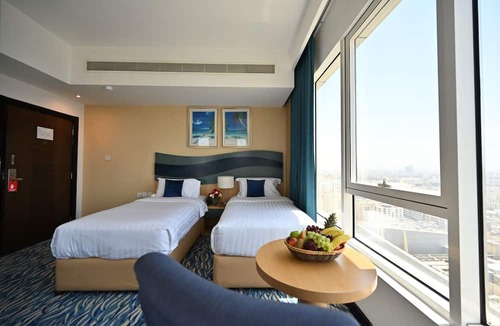 Al Hoora Hotel | Harbour Suites Hotel from Holiday Gulf Hotel