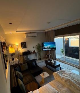 Al Aqiq Apartment | Cozy Studio in the Heart of the City with Tower Views & Private Outdoor Space