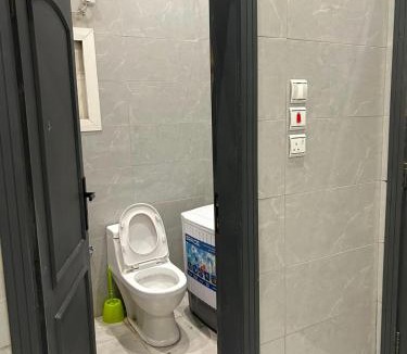 Al Bawadi Apartment | غرفة وحمام
