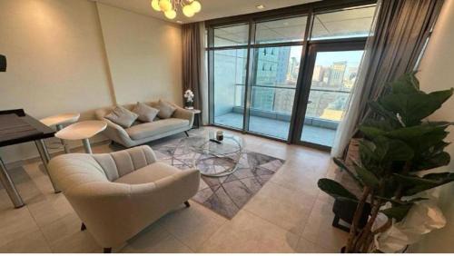 Awali Apartment | Modern 1-Bedroom Apartment with Stunning City & Sea Views at Era Tower