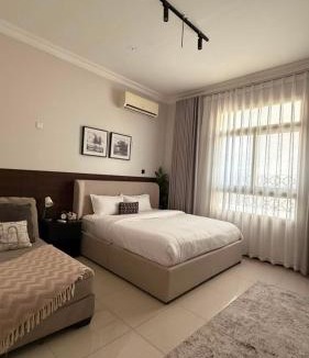 Dhahran Apartment | Lovely-19 مكونه من غرفتين نوم وصاله