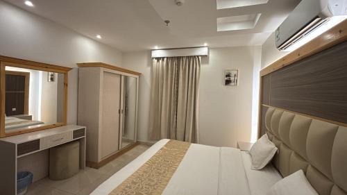 Al Hawiyah Apartment | المرجان الأبيض للشقق المخدومة 4