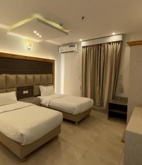 Al Hawiyah Apartment | المرجان الأبيض للشقق المخدومة 4