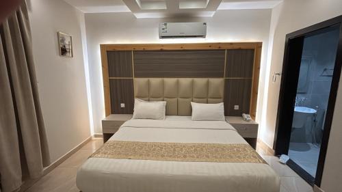 Al Hawiyah Apartment | المرجان الأبيض للشقق المخدومة 4