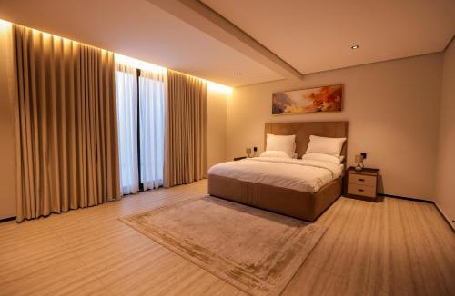 Al Hamra Apartment | Luxury apartment with one bedroom and a living room, modern furnishings, full service, 11 m