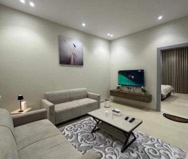 Al Kharj Apartment | شقة غرفة وصالة الخزامى - bedroom apartment with a living room