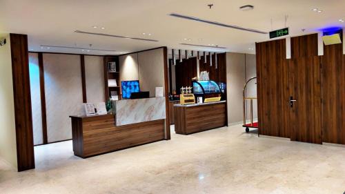 Qurish Street Hotel | الإقامة الذهبية للشقق المخدومة