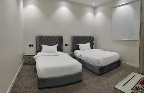Al Hawiyah Hotel | المرجان الأبيض للشقق المخدومة