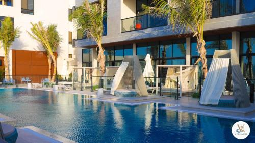 Durrat Al-Arous Apartment | V Beach للعائلات - في بيتش