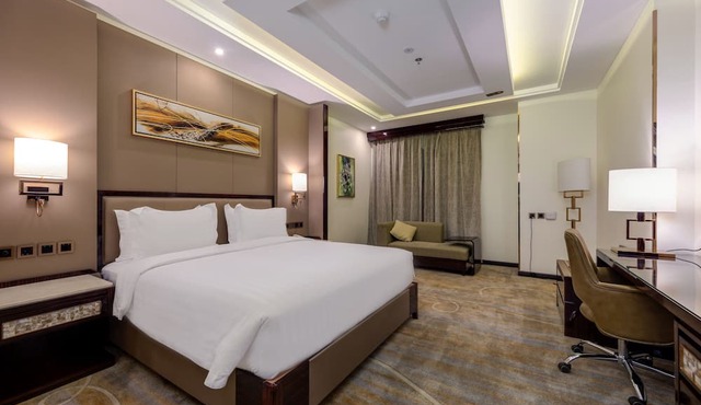 Al Ertiqaa Hotel